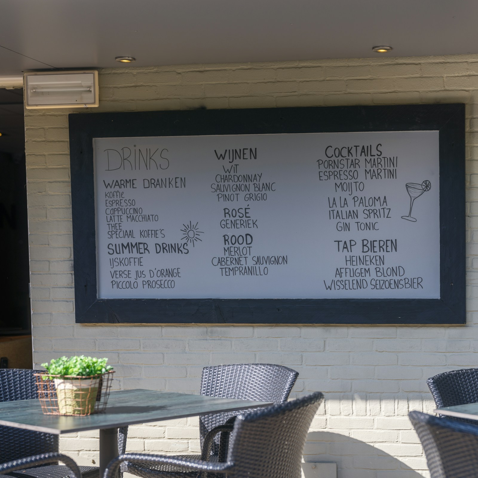 Handwritten menu board with seasonal specials